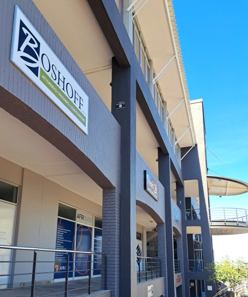 Sign outside of offices used by "Boshoff Attorneys, Notaries &  Conveyancers".